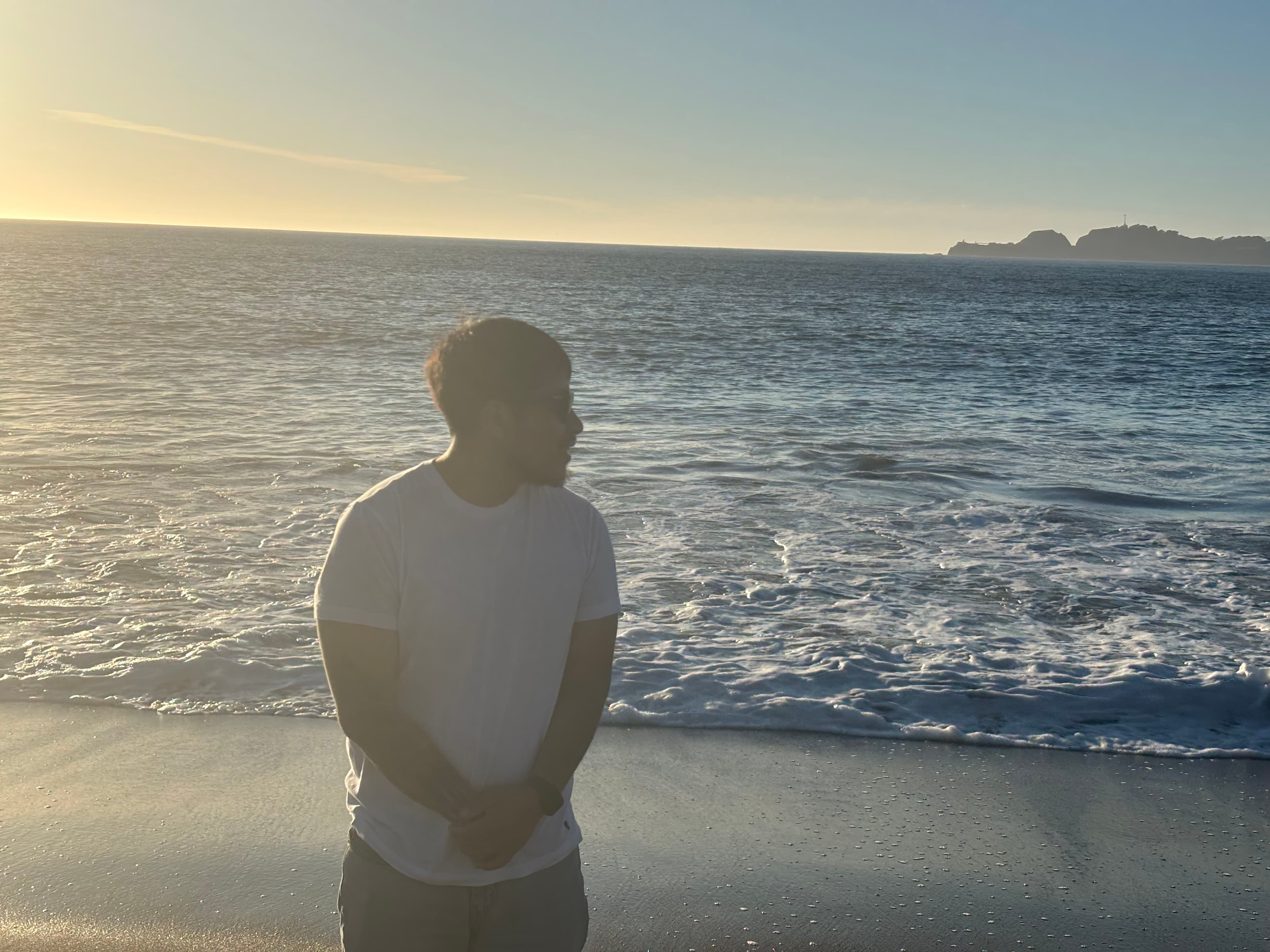 Ivan Ambrocio on the beach at sunset